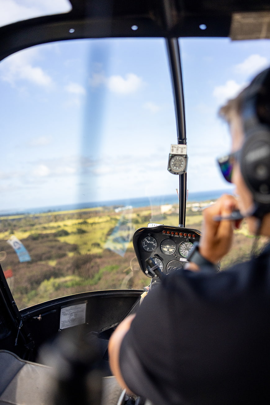 Helicopter Pilot Cockpit View Over Coastal Landscape