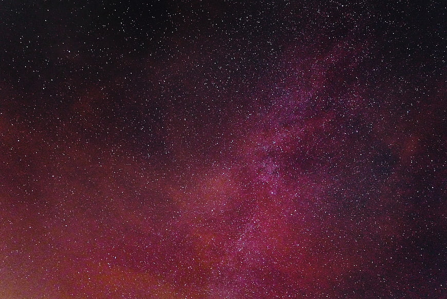 Vibrant Purple and Red Milky Way Galaxy Night Sky