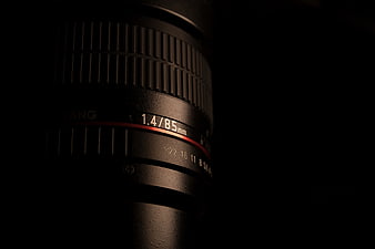 Close-up of Black Camera Lens with Red Ring