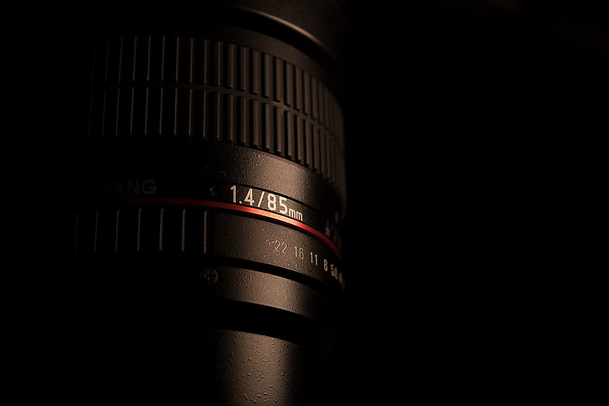 Close-up of Black Camera Lens with Red Ring
