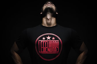 Bearded Man Wearing Black T-Shirt With Red Legendary Logo