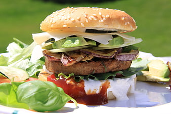 Healthy Veggie Burger With Avocado And Grilled Mushrooms On White Plate