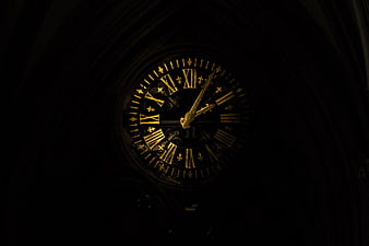 Dark Gothic Clock Face with Gold Roman Numerals