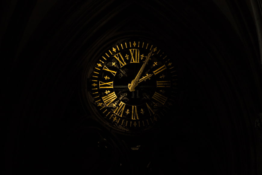 Dark Gothic Clock Face with Gold Roman Numerals