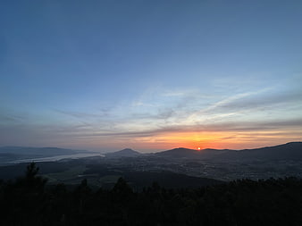Sunset Over Mountain Valley and Lake Landscape