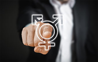 Businessman touching gender symbols on digital interface