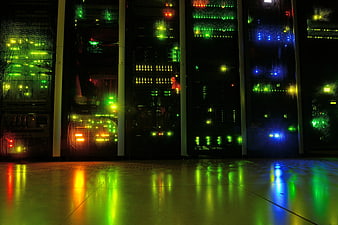 Illuminated Server Racks In Dark Data Center With Colorful LED Lights