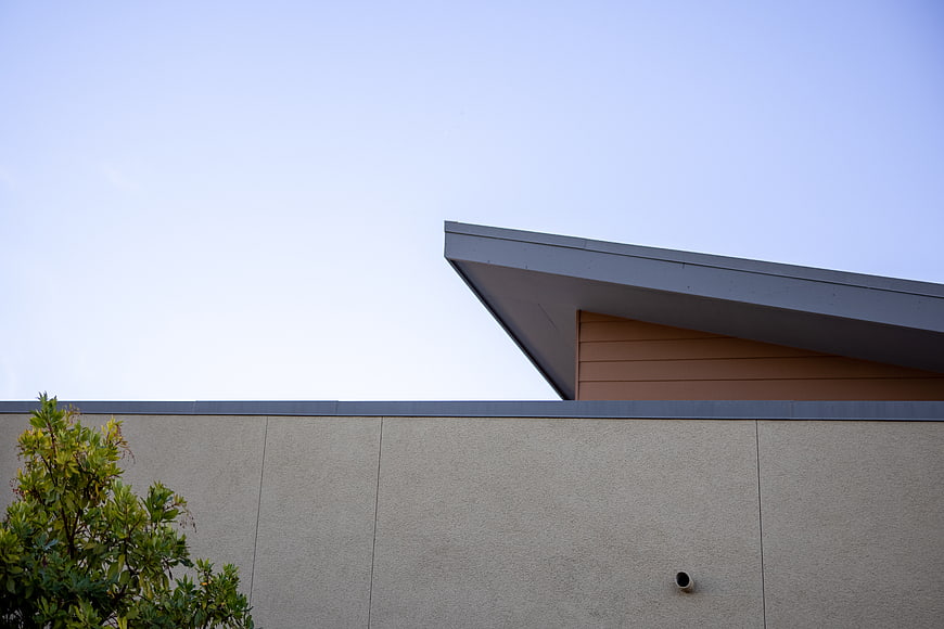 Modern Architectural Roof Detail with Blue Sky