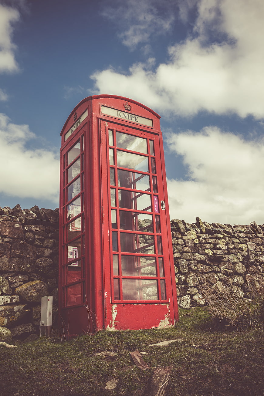Vintage Red Telephone Box in Rural English Countryside