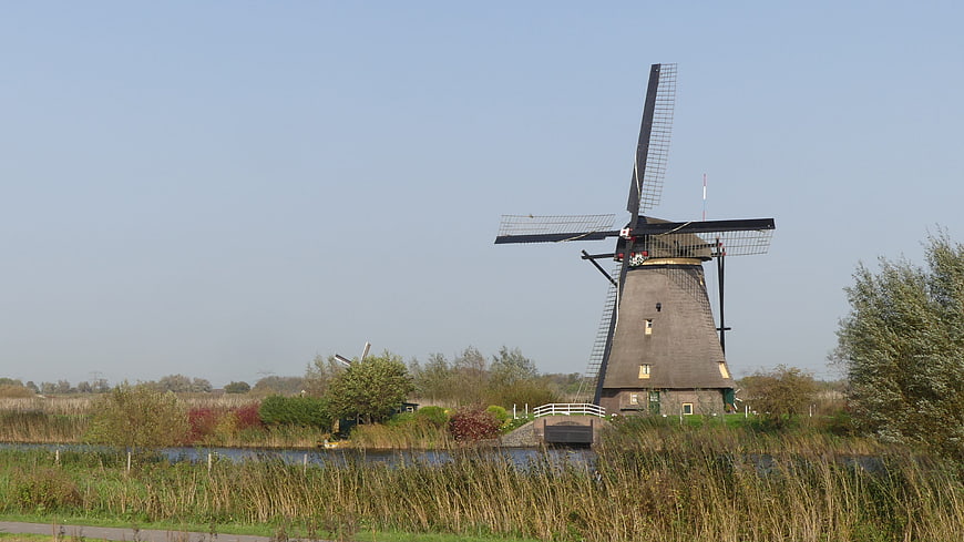 Traditional Dutch Windmill in Kinderdijk Landscape