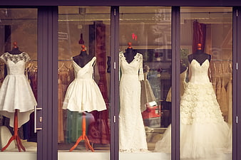 Bridal Shop Window Display with Wedding Dresses on Mannequins