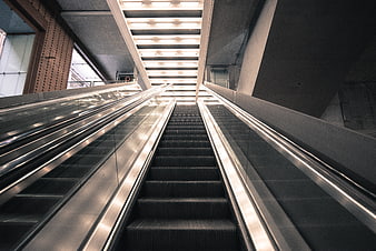 Low angle view of modern escalators in a subway station