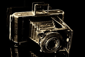 Vintage Sepia Tinted Folding Camera on Black Background