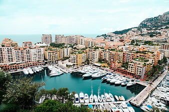 Aerial View of Monaco Marina with Luxury Yachts and Cityscape