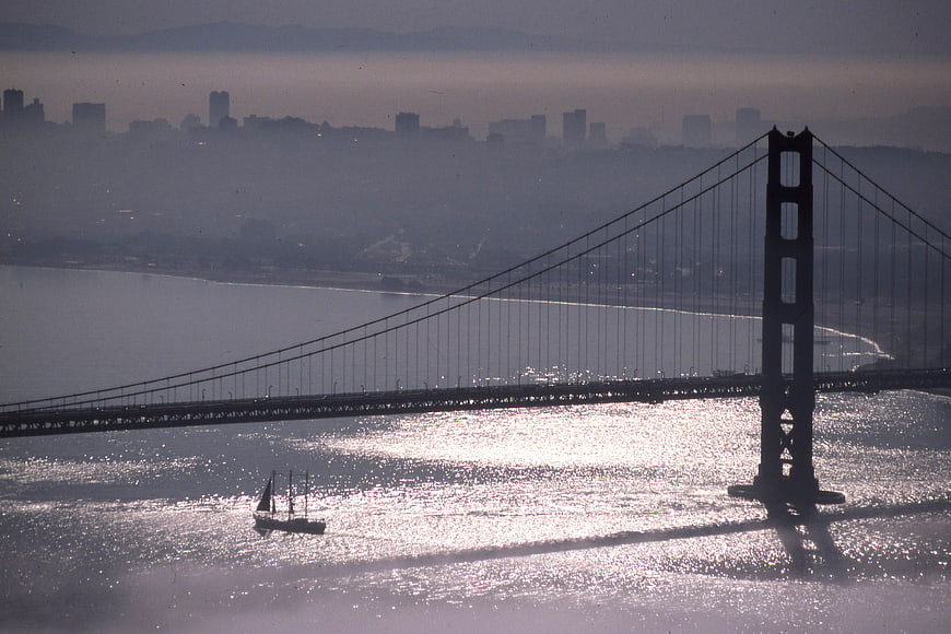 Silhouette of Golden Gate Bridge with Sailboat in San Francisco