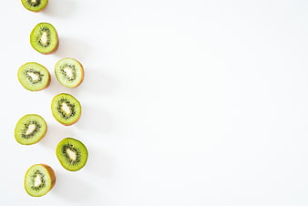 Sliced Kiwi Fruit Arrangement on White Background