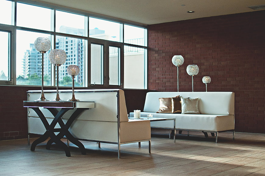 Modern living room with white sofa and crystal lamps