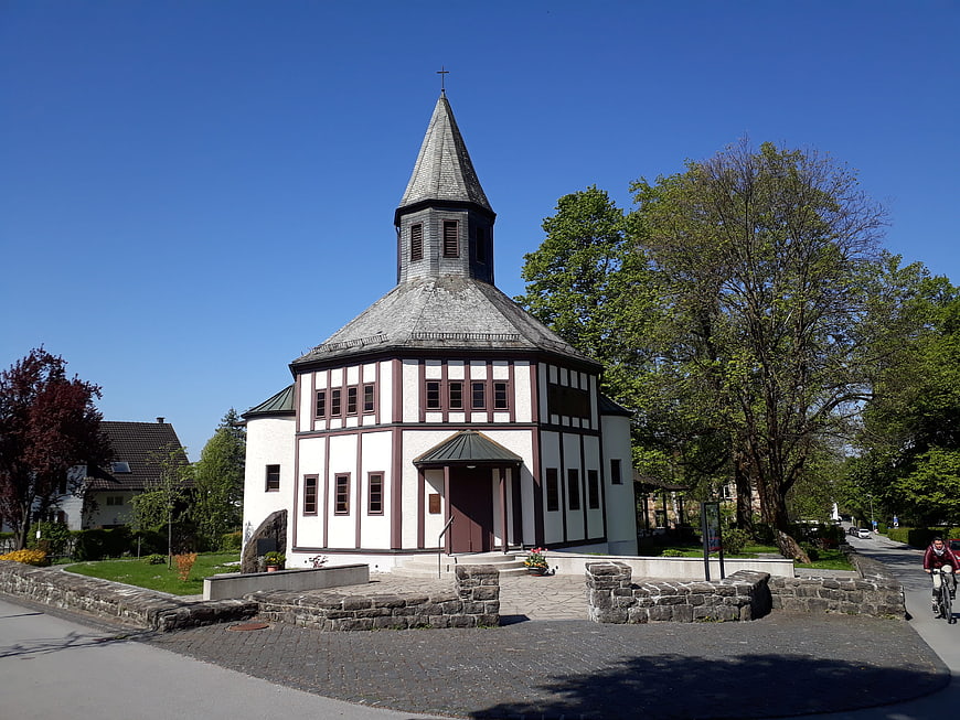 Historic octagonal church with timber framing and spire