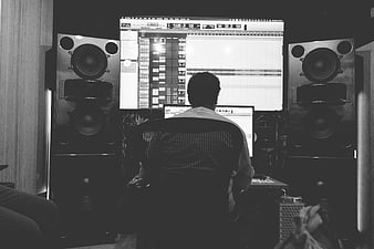 Music Producer Working in Recording Studio