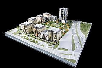 Architectural model of modern residential complex with high-rise tower