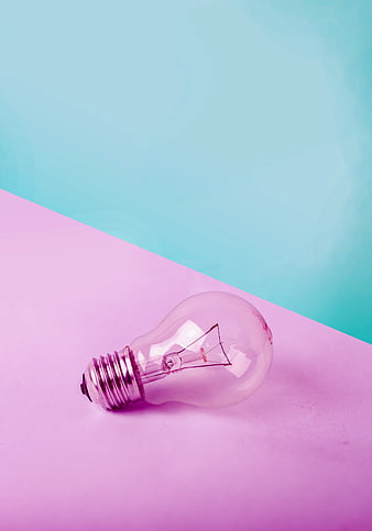 Clear Light Bulb on Pink and Blue Background
