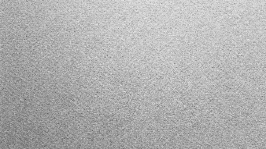 Gray textured paper background with subtle grain pattern