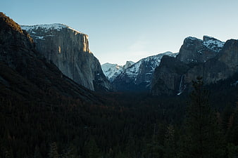 Majestic Yosemite Valley Landscape with Snow-Capped Granite Cliffs