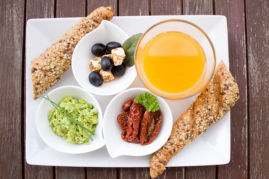 Healthy Mediterranean Breakfast Platter with Bread and Juice