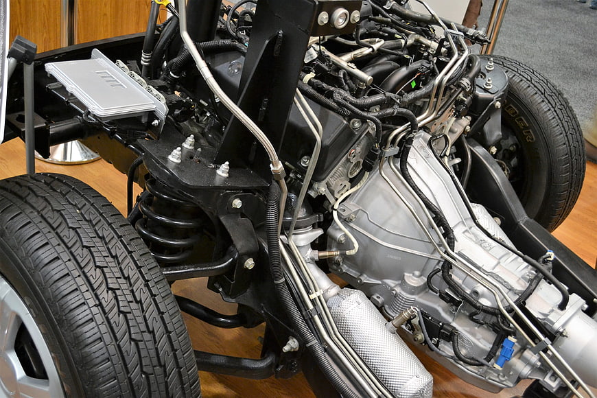 Exposed Car Chassis with Engine, Suspension, and Tires