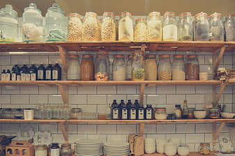 Organic grocery store shelves with glass jars and dry goods