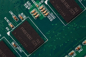 Close-up of Green Printed Circuit Board with Electronic Chips