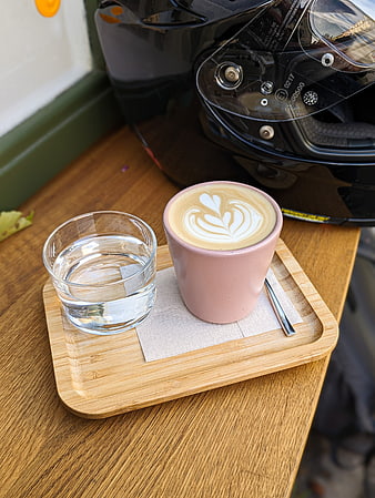 Latte with Helmet on Wooden Table