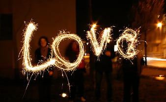 Sparkler Light Painting Spelling Love At Night