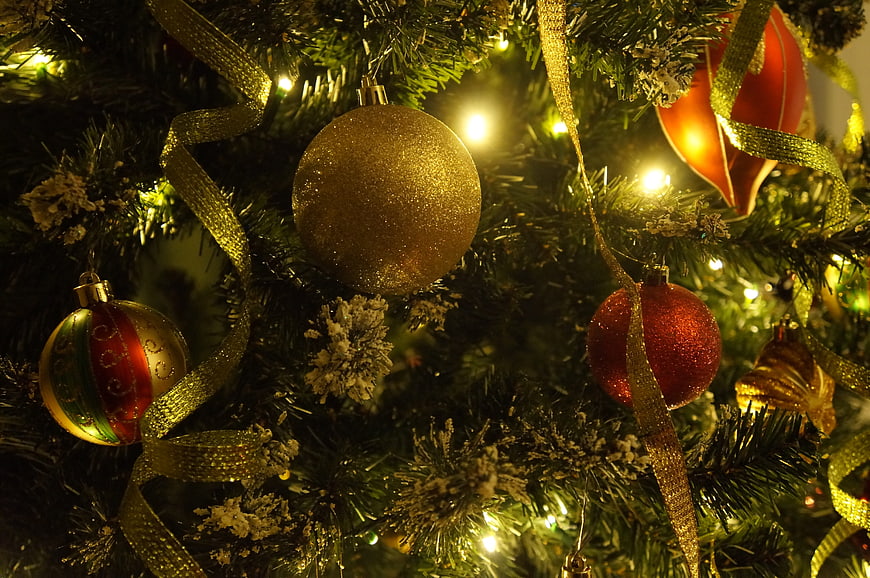 Close-up of Christmas Tree with Gold and Red Ornaments