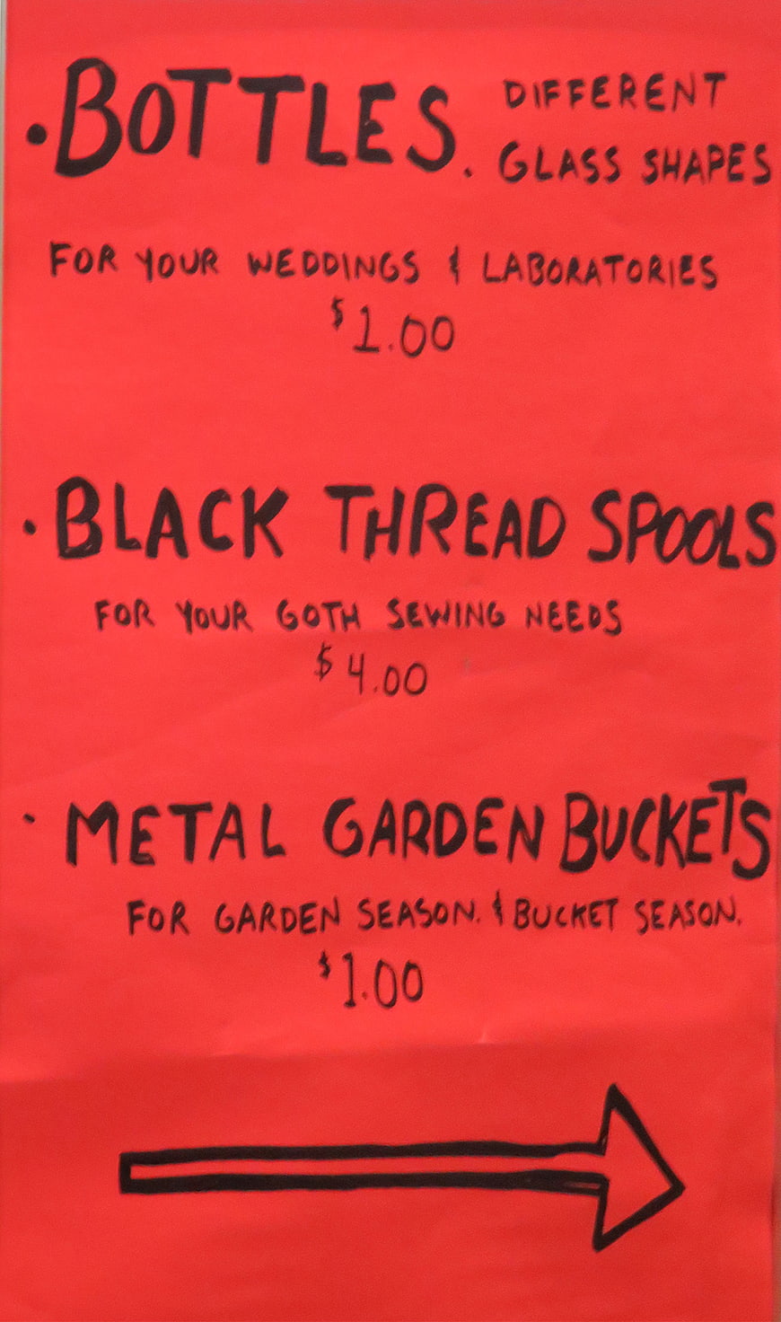 Handwritten red sale sign for bottles, thread, and buckets
