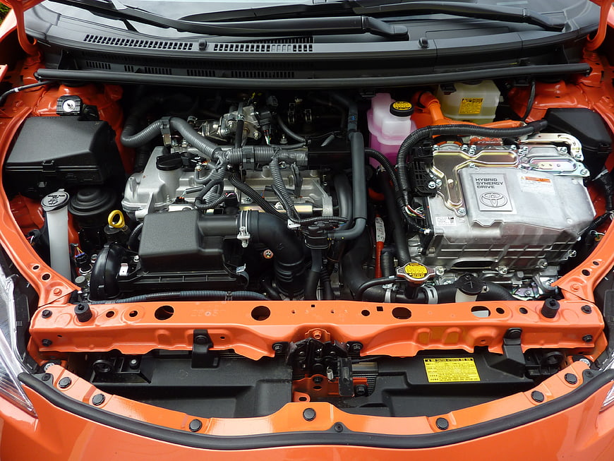 Orange Toyota Hybrid Engine Bay Close-Up