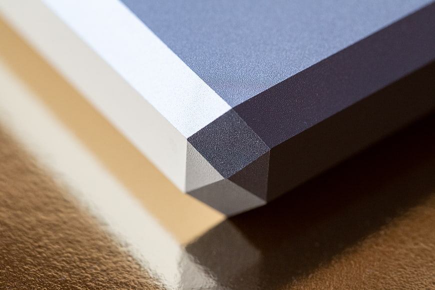Close-up of Geometric Corner with Blue and White Layers