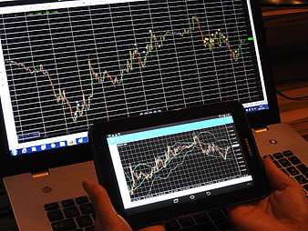 Forex Trading Analysis on Laptop and Tablet