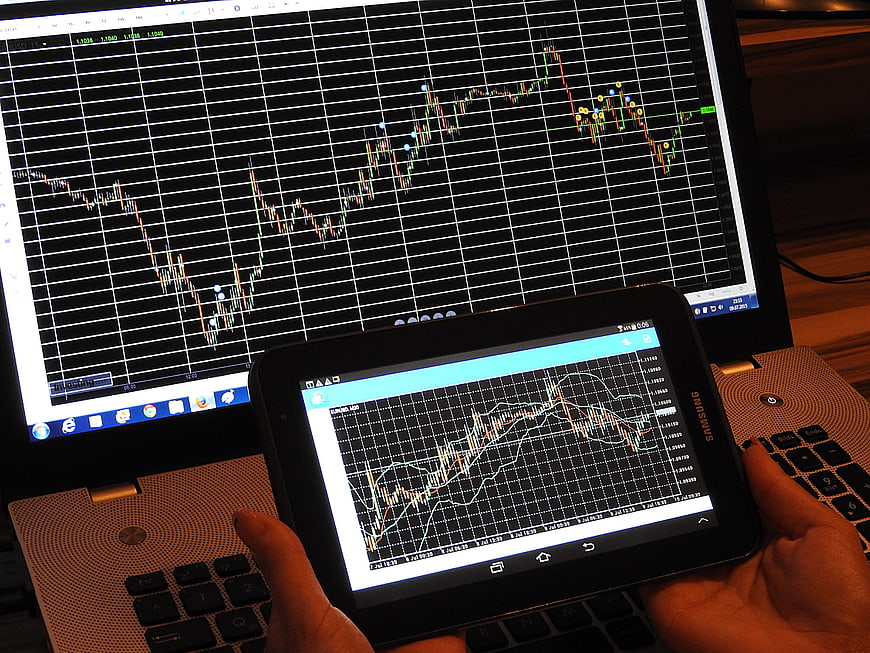 Forex Trading Analysis on Laptop and Tablet