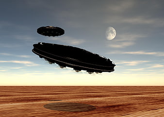Two UFOs Flying Over Desert Landscape at Sunset