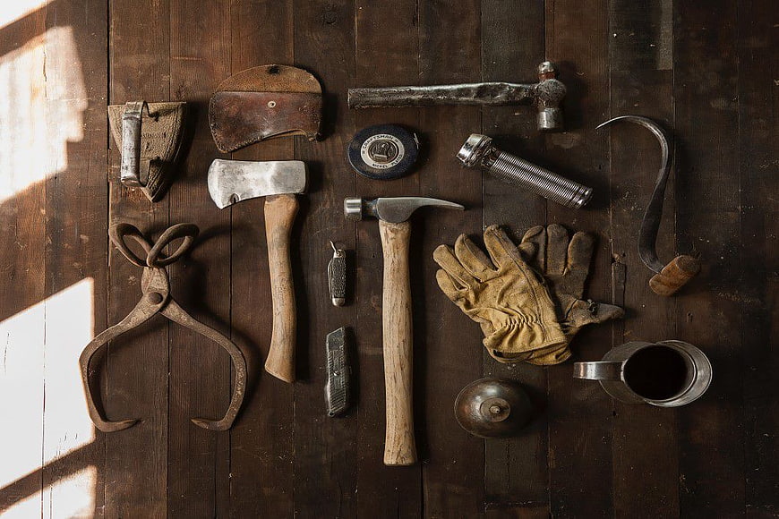 Vintage Carpenter Tools Flat Lay on Dark Wood