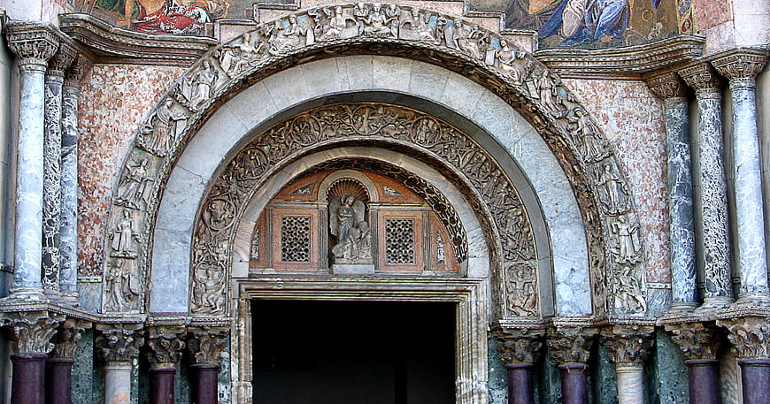 Ornate Romanesque Church Portal with Sculpted Archivolts