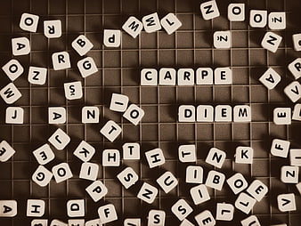 Carpe Diem Scrabble Tiles on Grid Background