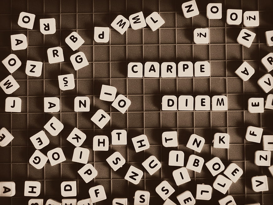 Carpe Diem Scrabble Tiles on Grid Background