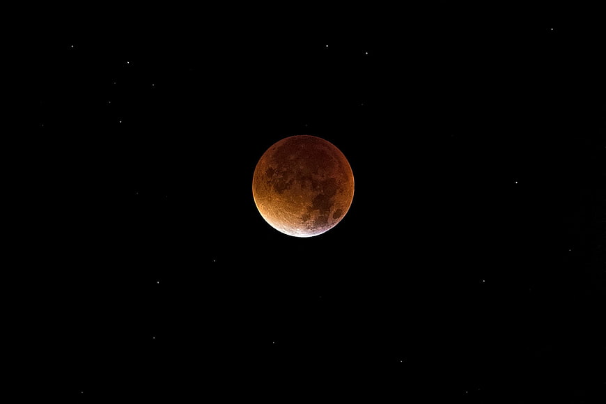 Blood Moon Lunar Eclipse in Night Sky