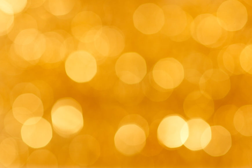 Golden Yellow Bokeh Background with Soft Blurred Lights