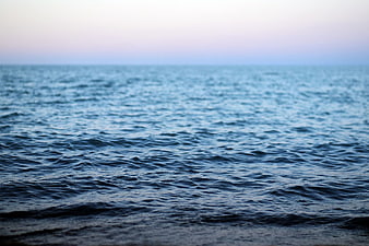 Calm Blue Ocean Waves at Dusk