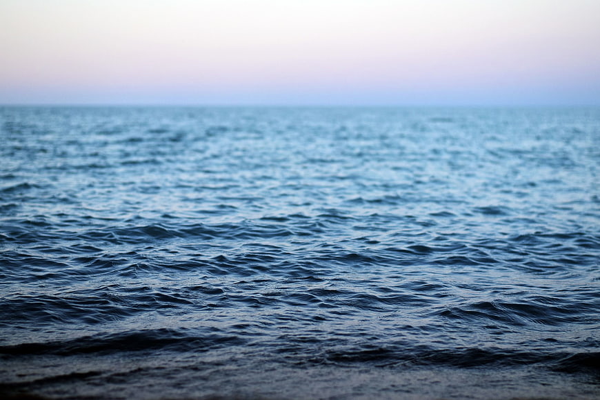 Calm Blue Ocean Waves at Dusk