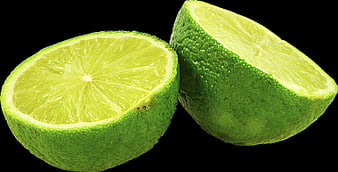 Fresh Green Lime Halves Isolated on Black Background