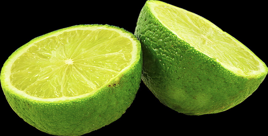 Fresh Green Lime Halves Isolated on Black Background